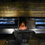 Fogo volta ao centro da gastronomia e reforça tradição da parrilla